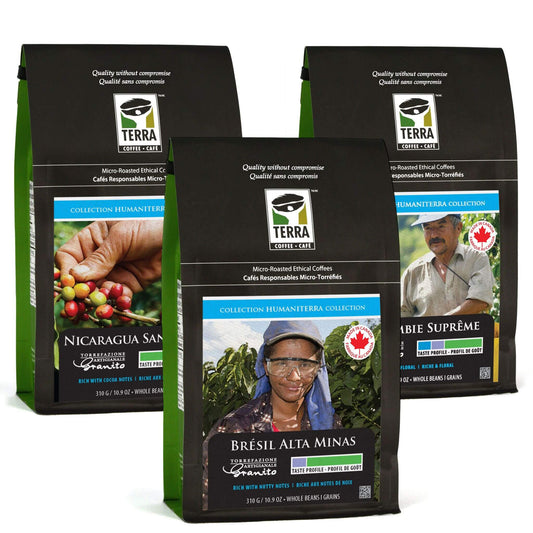 Terra Humaniterra Collection coffees — Nicaragua Santa Celia, Brazil Alta Minas, and Colombia Suprême on counter.